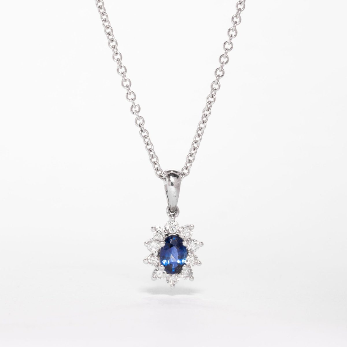 Blue Sapphire And Diamond Cluster Pendant