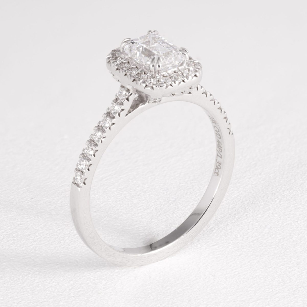 Emerald Diamond Halo Engagement Ring