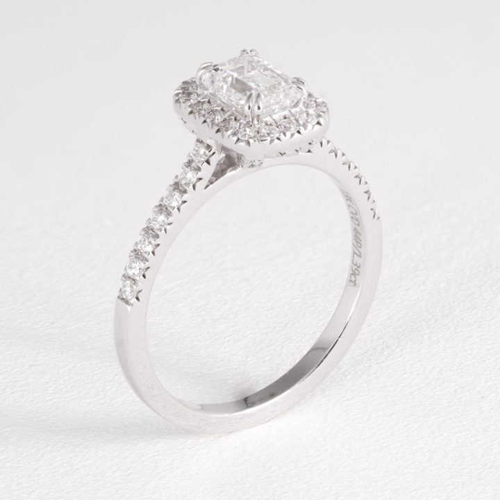 Emerald Diamond Halo Engagement Ring